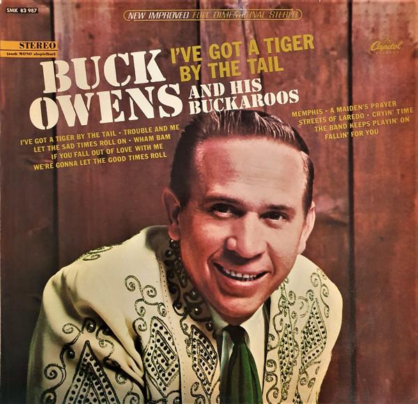 Buck Owens And His Buckaroos - I've Got A Tiger By The Tail