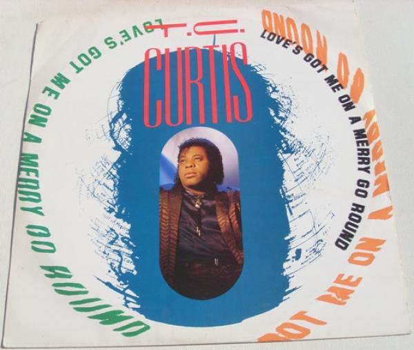 T.C. Curtis - Love's Got Me On A Merry Go Round